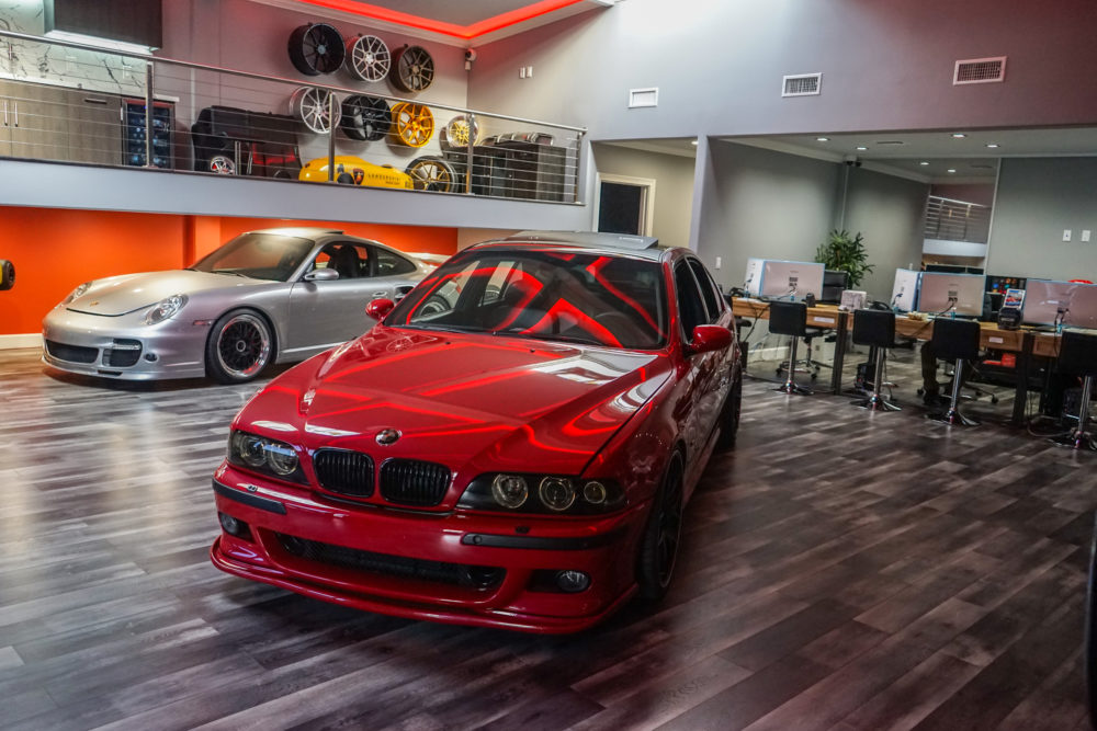 n4sm need 4 speed motorsports showroom overview Porsche 911 Turbo and BMW M5 showroom floor