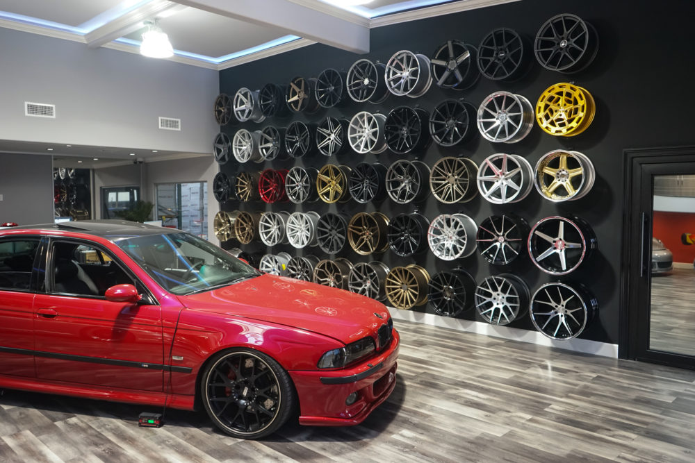 n4sm need 4 speed motorsports Red BMW M5 wheel wall