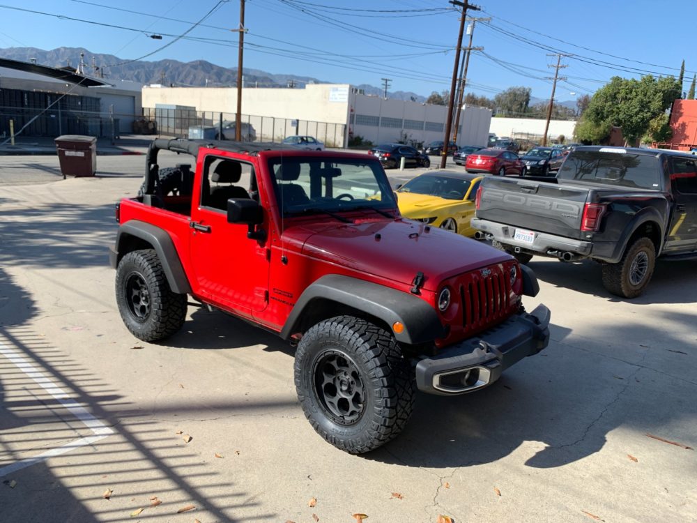 2014 Jeep Wrangler Sport KMC wheels Nitto Tires Ridge Grappler 33x12.5 R17 Tires KMC Wheels KM541