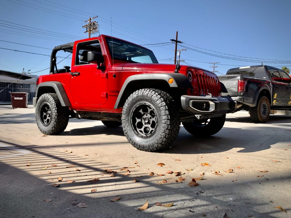 2014 Jeep Wrangler Sport KMC wheels Nitto Tires Ridge Grappler 33x12.5 R17 Tires KMC Wheels KM541 Dirty Harry