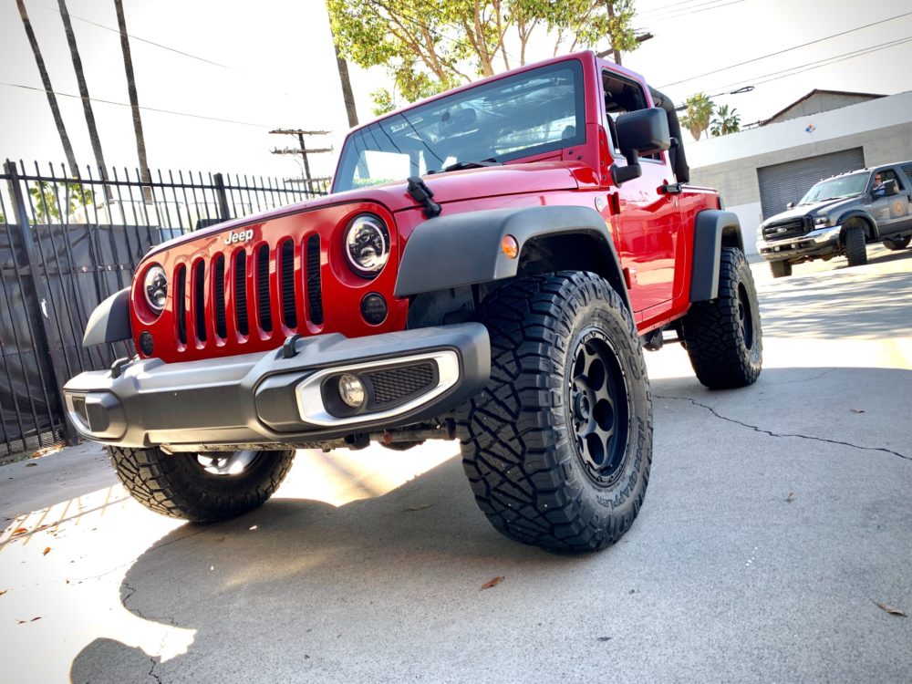 2014 Jeep Wrangler Sport KMC wheels Nitto Tires Ridge Grappler 33x12.5 R17 Tires KMC Wheels